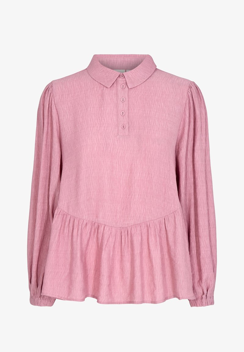 Světle růžová blůza s límečkem, zapínáním na knoflíky vpředu a dlouhými rukávy. Má strukturovanou tkaninu a peplum lem v pase.