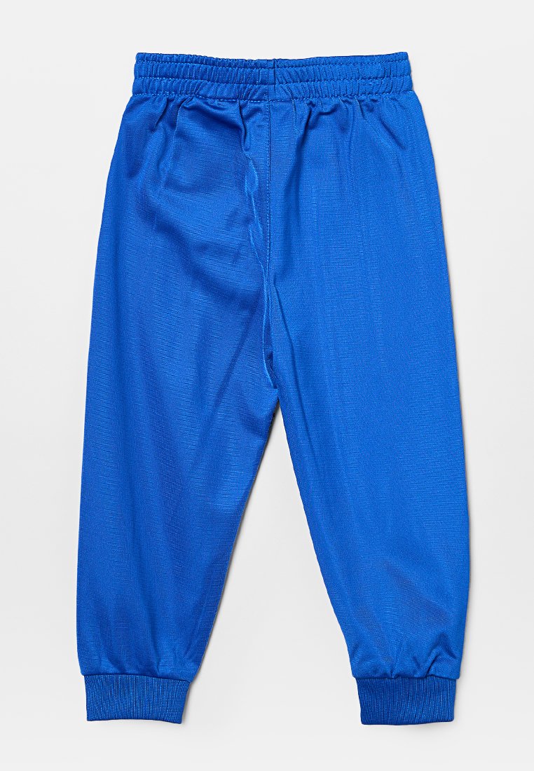 Pantaloni sportivi blu realizzati in tessuto liscio, dotati di una vita elastica e polsini affusolati con un sottile motivo testurizzato.