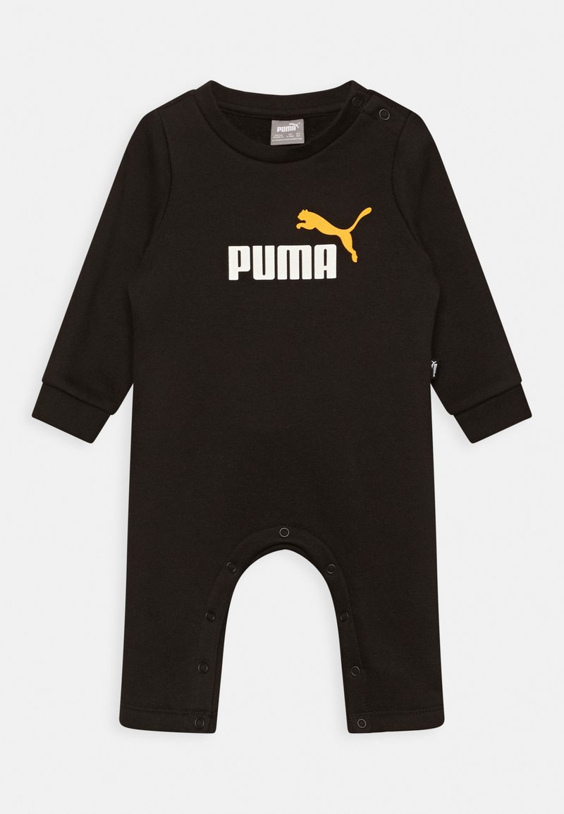 Musta pitkähihaiseen puuvillainen potkupuku, jossa valkoinen "PUMA"-logo ja keltainen puman kuvio. Napit kaulassa ja alaosassa.