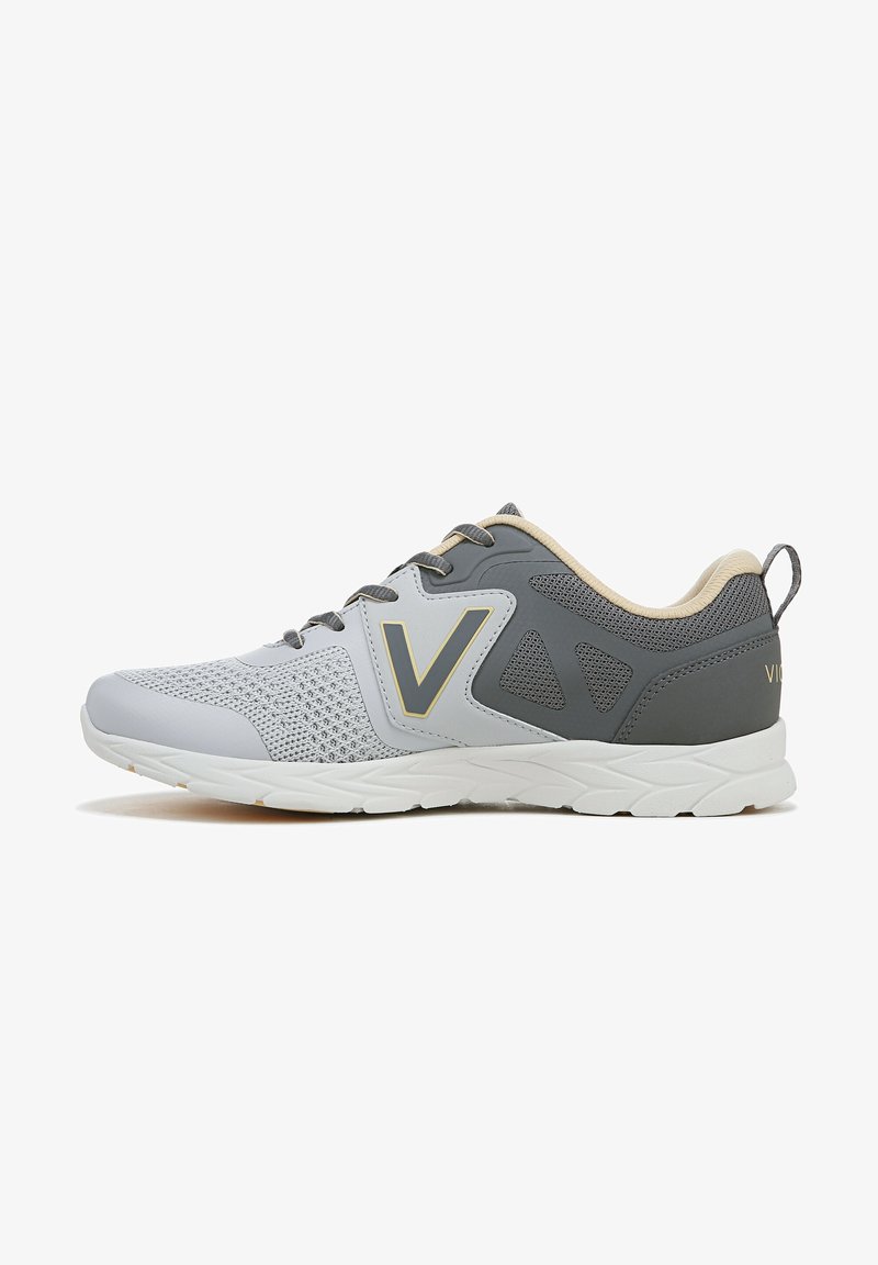 Lightweight athletic shoe featuring a gray mesh upper with a solid gray accent, white sole, and subtle gold logo detail.