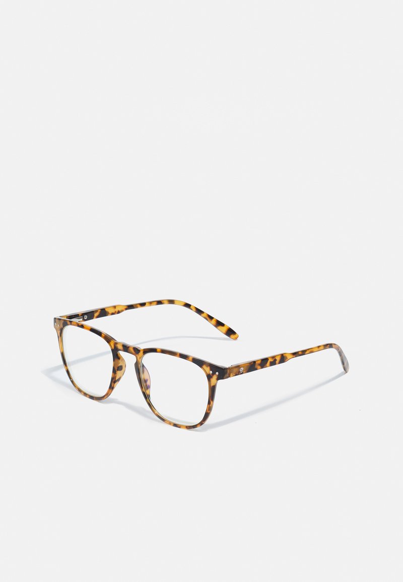 Lunettes de vue rectangulaires en écaille de tortue avec des verres transparents, présentant une finition brillante et des branches fines, affichant un motif distinctif tout au long.