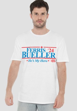 White cotton t-shirt featuring blue and red text: "FERRIS '24 BUELLER He's My Hero" with two red stars. Casual fit and short sleeves.