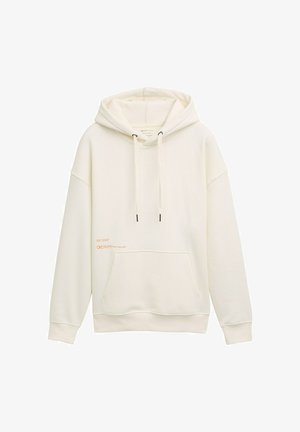 Valge kapuutsiga dressipluus, millel on ees taskud, soonikkoes mansetid ja allääred, esitades oranži sildi alumises osas. Pehme ja sile tekstuur.