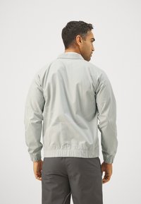 Puma AC MILAN  STATEMENT TRACK JACKET - Klub merchandise - flat light gray/grape mist