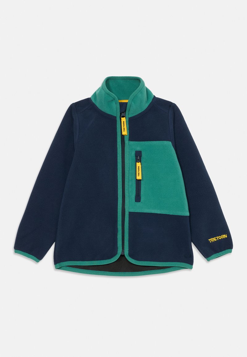 Fleecejakke i marineblå og grønn med høy krage, glidelåslommer og kontrasterende teksturer. Har logo og broderte detaljer.