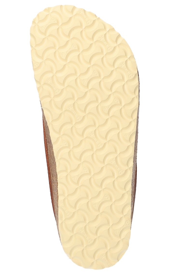 Sola di scarpa in pelle marrone con un'esterno in gomma gialla testurizzata caratterizzato da un motivo a onde per una migliore aderenza. Bordo curvato visibile.