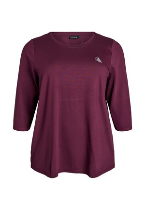 Burgunderfarbenes Langarmshirt mit Rundhalsausschnitt, mit einer subtilen Textur und einem kleinen Logo-Akzent auf der Brust. Lässige Passform.