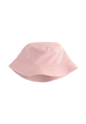 Pink bucket hat featuring a soft cotton material, round crown, and wide, flexible brim with subtle texture.