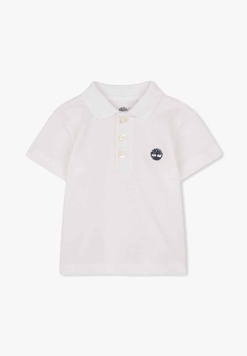 Polo blanc en tissu texturé, doté d'un col, d'une patte de boutonnage à trois boutons et d'un logo arbre bleu marine sur la poitrine gauche.