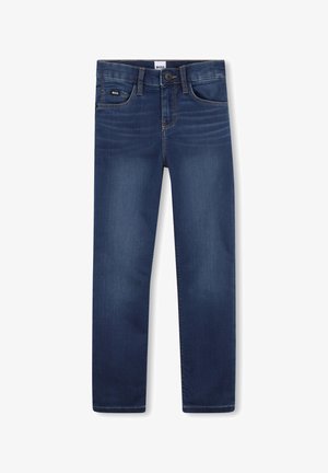 Jean en denim bleu foncé avec une coupe droite, cinq poches et des coutures contrastées. Étiquette logo sur la poche avant. Texture lisse.