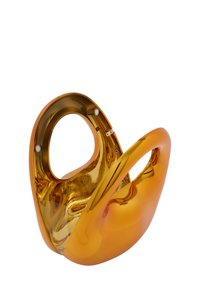 Gennemsigtig amber håndtaske med glat, blank overflade. Rundet form og stor håndtag. Interiøret har synlige teksturer og hardware.