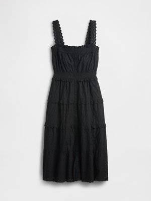 Schwarzes, gestuftes Kleid aus strukturiertem Stoff mit Spitzenakzenten an den Trägern und am Oberteil, mit einer durchgehenden Knopfleiste und gewelltem Saum.