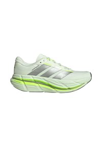 Chaussure de course blanche et argentée avec des accents vert néon, semelle épaisse et rembourrée portant l'inscription "DREAMSTRIKE", vue de côté sur fond blanc.