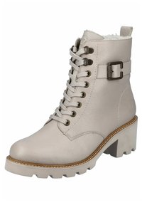 Bottine en cuir beige avec surface texturée, bout rond, fermeture à lacets à l'avant, détail de boucle sur le côté et semelle en caoutchouc épaisse avec motif de grip.