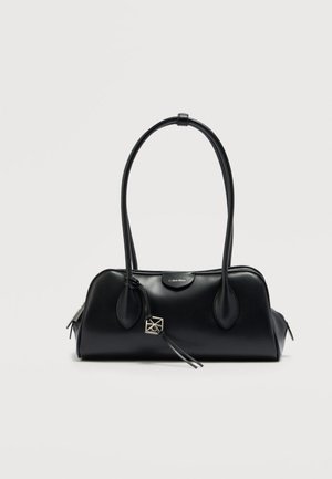 Black leather handbag with two rounded handles, prominent logo, and a silver hardware accent. Smooth texture and elongated oval shape.