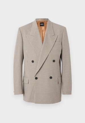 Blazer beige doppiopetto con motivo a quadretti fini, ampi revers, quattro bottoni neri e tasche con patta, foderato in raso marrone chiaro.