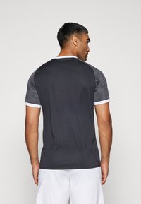 JAKO ICONIC - T-shirt print - schwarz/anthrazit
