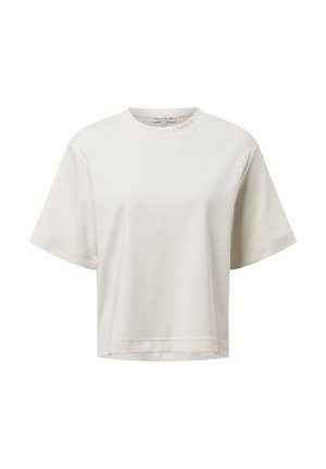 Koszulka z krótkim rękawem w kolorze kremowym, wykonana z miękkiego materiału, o luźnym kroju, z okrągłym dekoltem i bez wyraźnych wzorów.