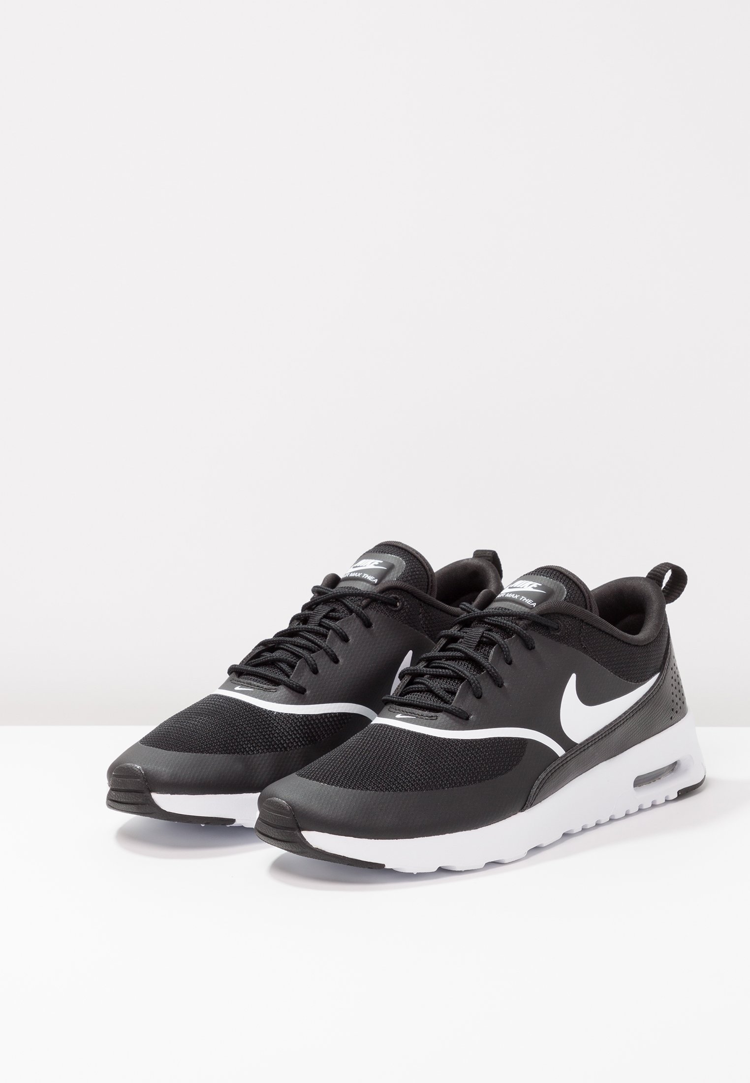 black nike thea trainers