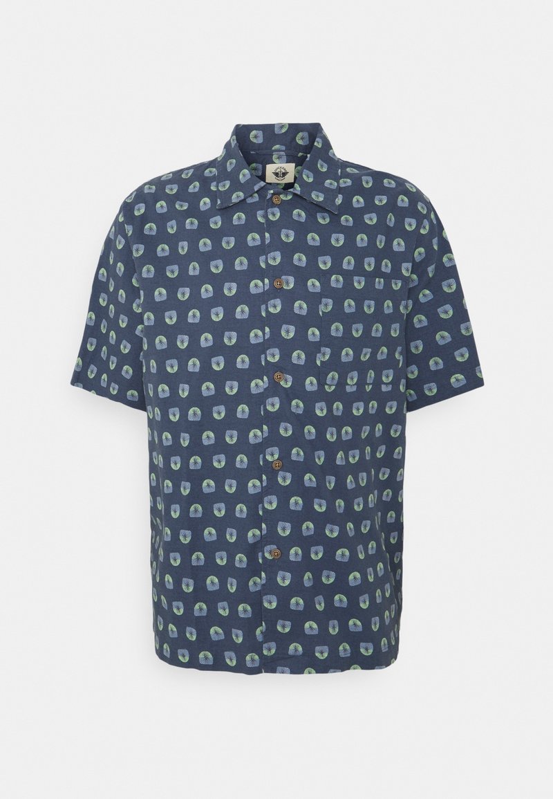 Chemise à manches courtes bleu marine avec col et boutons, présentant un motif répétitif de petites formes abstraites vertes et bleu clair.