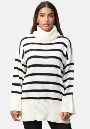 Schwarz-weißer gestreifter übergroßer Rollkragenpullover mit langen Ärmeln, gerippter Textur und hohem Kragen. Weiches Strickmaterial.