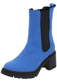 Botín de ante azul hasta el tobillo, con paneles laterales elásticos negros, tacón negro robusto y suela de goma texturizada; líneas limpias y diseño moderno.