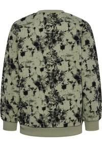 Sweatshirt vert avec un motif abstrait noir. Présente des poignets et un ourlet côtelés, un col rond et un tissu texturé.