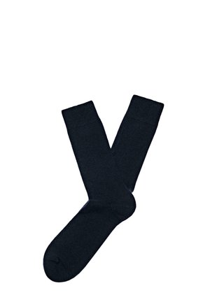 Calzini alla caviglia di un blu navy scuro realizzati in un morbido tessuto a maglia con una superficie liscia e bordi a costine, privi di motivi o elementi decorativi.