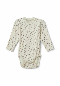 Kerman hihaton vauvan bodysuit, jossa on kermaisen värinen kangas, punainen kukkapaino, pyöreä kaula-aukko ja neppari alhaalla.