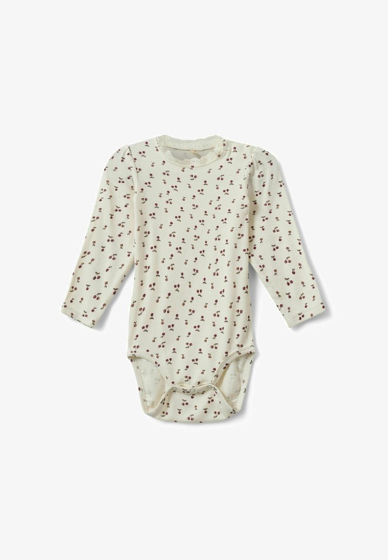 Kerman hihaton vauvan bodysuit, jossa on kermaisen värinen kangas, punainen kukkapaino, pyöreä kaula-aukko ja neppari alhaalla.