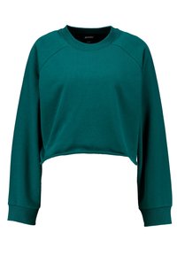 Felpa corta in teal con scollatura rotonda, maniche lunghe a raglan e tessuto morbido e testurizzato. Senza loghi o motivi visibili.