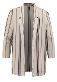 Jasně krémový blazer s vertikálními černými pruhy, s dlouhými rukávy, otevřeným předním dílem a hladkou texturou látky. Bez knoflíků nebo zapínání.