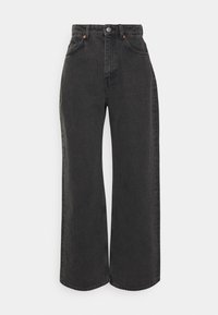 Jeans de tiro alto y pernera ancha en denim negro, con cierre de botón, cuatro bolsillos y costuras visibles a lo largo de las costuras.