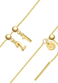 Guldkedjeörhängen med hängande siffra "21" och runt hänge med bladdesign. Polerad yta med en mjuk textur.