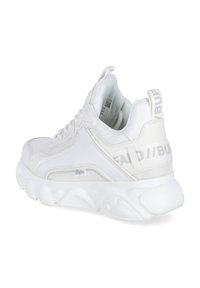 White sneaker featuring a mix of smooth and textured materials, chunky sole, and branded heel tab with logo. Laces in tonal color.