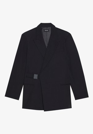 Black tailored blazer with a notched lapel, single button closure, and textured accents. Features two front pockets and a structured silhouette.