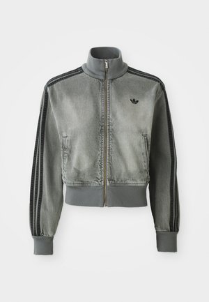 Grey zip-up sports jacket with high collar, ribbed cuffs and hem, black stripes on sleeves, and a small black Adidas logo on the chest.