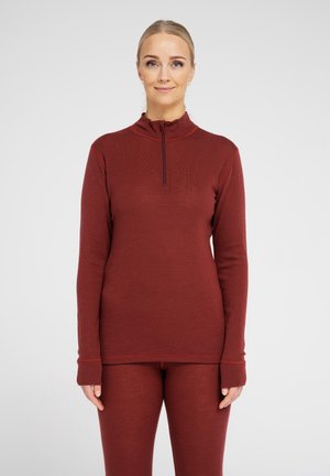 Ribbet bordeaux langærmet top med lynlås krave, med tætsiddende design og forlængede manchetter, parret med matchende tætsiddende bukser.