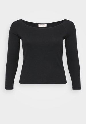 Melna ilga piedurkne topa izstrādājums, kas izgatavots no ribota auduma, ar plašu apaļu kakla izgriezumu un pieguļošu siluetu.