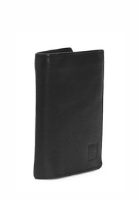 Portefeuille en cuir noir au design épuré, présentant une texture lisse et un détail embossé d'un côté. Forme compacte et verticale.