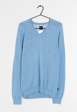 Light blue V-neck sweater with long sleeves, ribbed cuffs and hem, made from a soft, textured fabric. Label visible on the inside collar.