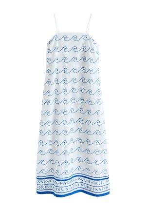 White sleeveless dress with thin straps, blue wave patterns throughout, and names of Greek islands along the hem.
