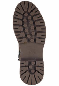 Brown rubber boot sole with a textured, patterned surface featuring hexagonal shapes and deep grooves for traction. Marked size 37.