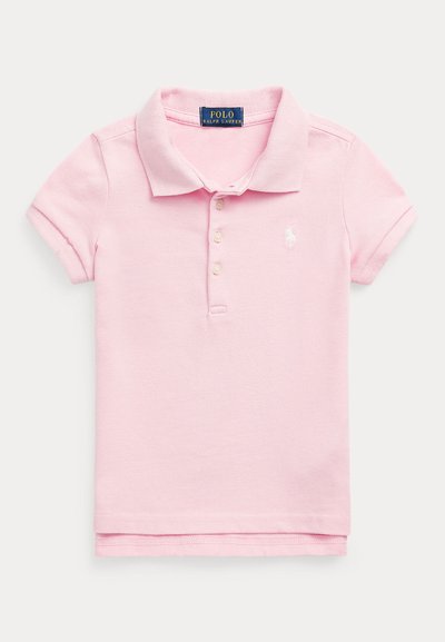 Vaaleanpunainen polo-paita, joka on valmistettu teksturoidusta kankaasta. Paidassa on kaulus ja lyhyet hihat, sekä pieni valkoinen logo rinnassa ja kolme nappia.