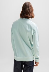 BOSS Melegítőfelső - turquoise aqua