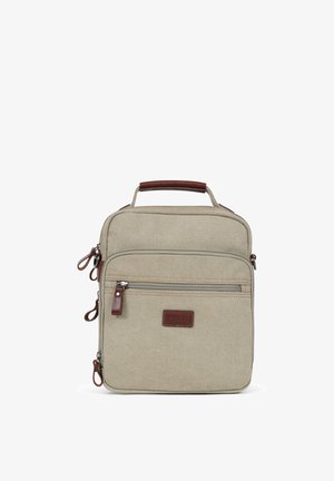 Sac rectangulaire en toile beige avec poche zippée à l'avant, tirettes en cuir marron et une petite poignée sur le dessus.