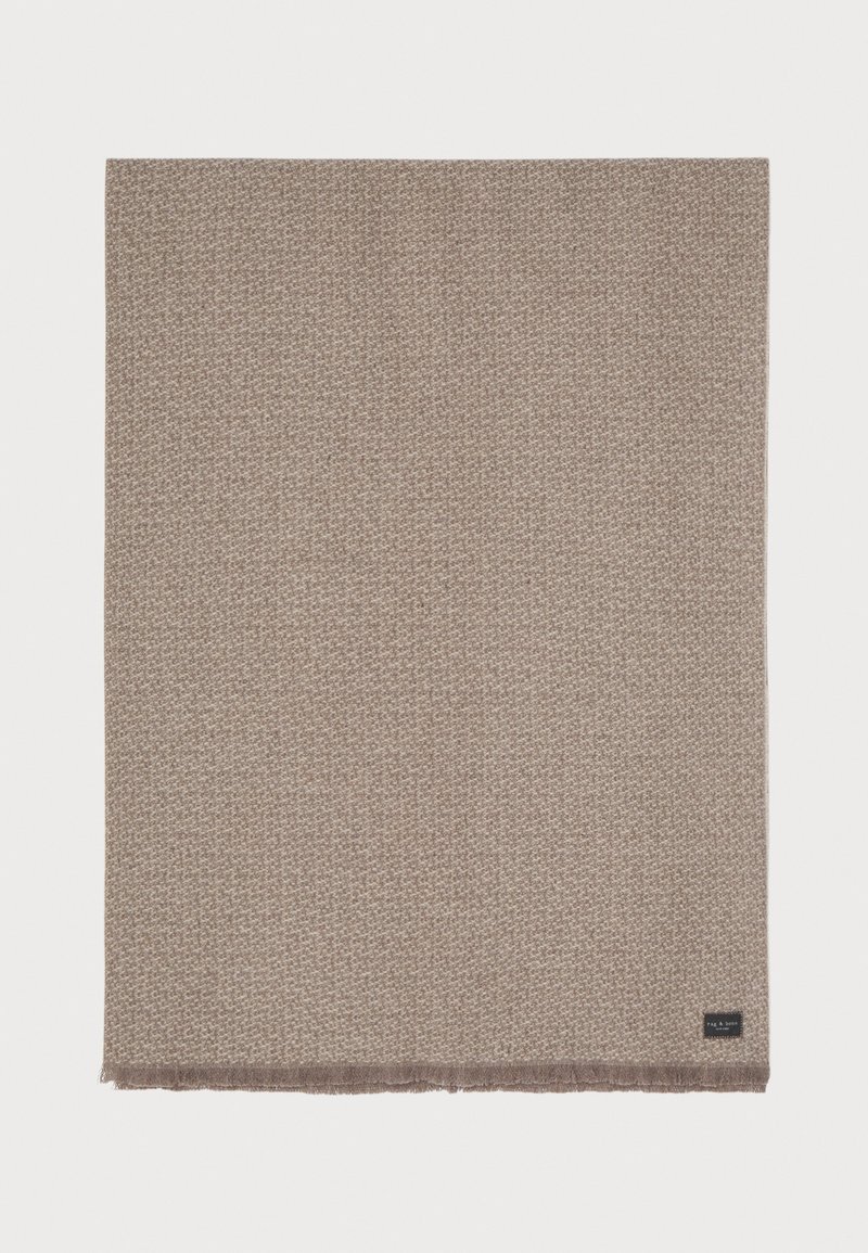 Brown woven scarf with a textured pattern, finished with a fringed edge, and a small brand label on one corner.