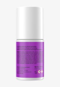 Vernis à ongles UV dans un contenant cylindrique, avec un capuchon blanc et une base violette, présentant un texte détaillé en plusieurs langues au dos. 6,5 ml.