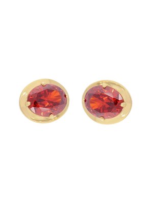 Gold-tone oval earrings featuring large, faceted red gemstones set in a smooth bezel, accentuated by four small prongs.