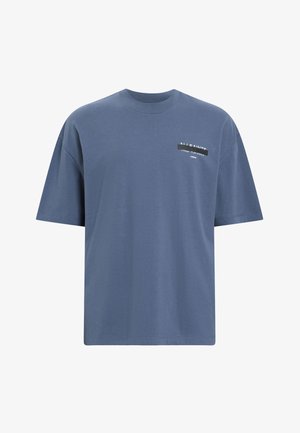 Blå bomullströja med avslappnad passform, rund halsringning och korta ärmar. Har en tryckt logotyp och text på bröstet.